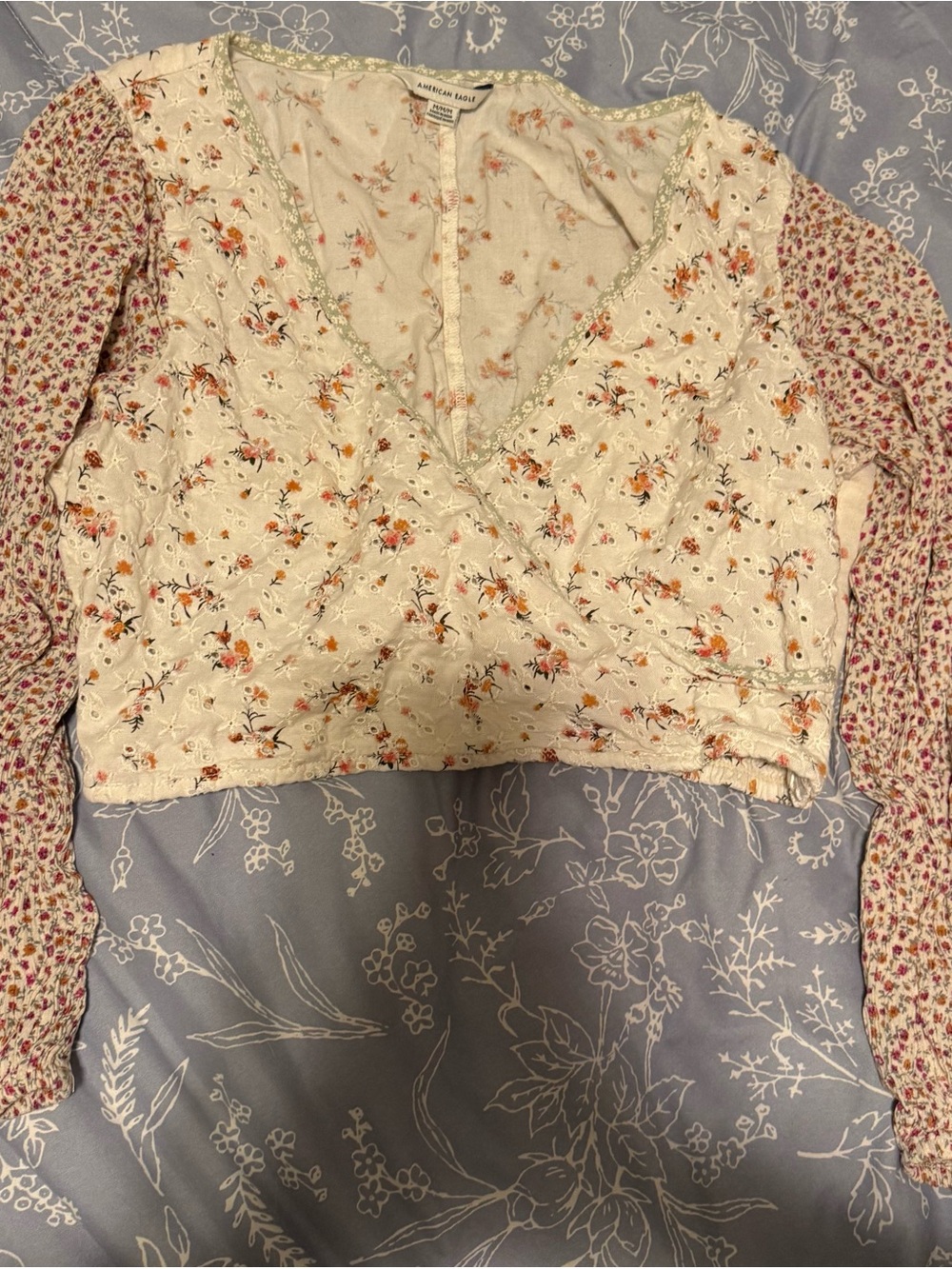 American Eagle Outfitters Floral Wrap Cropped Top in Cream with Pink Sleeves